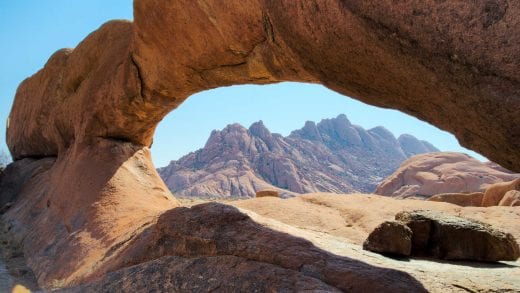 View of Spitzkoppe through rock arch in Namibia